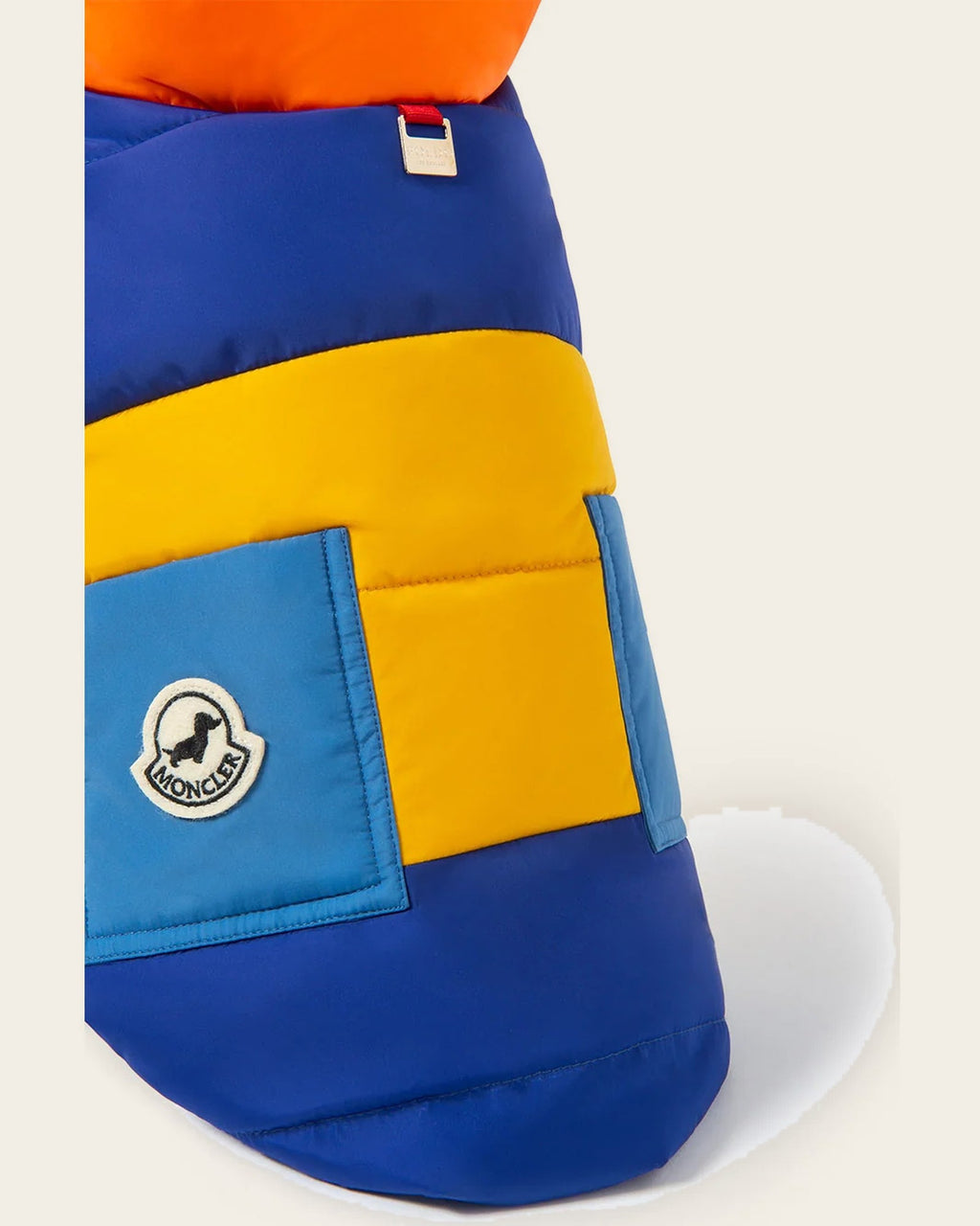 Monc x Poldo Mondog Puffer Jacket in orange & blue, detail